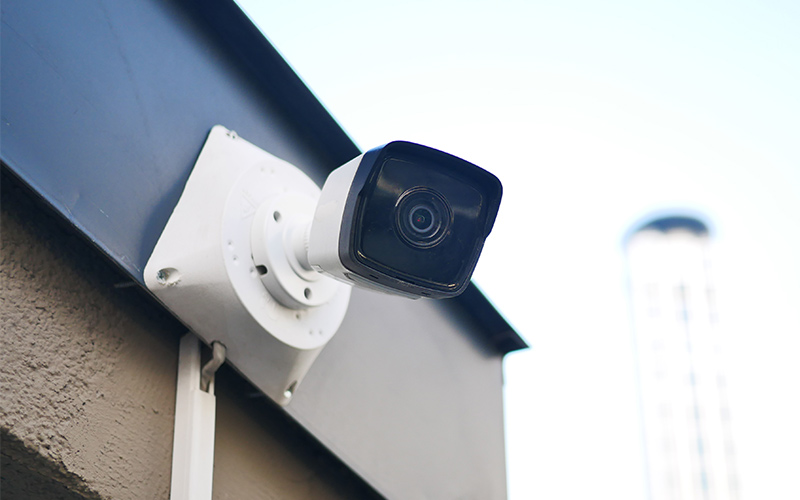Security camera mounted on an external wall of a home