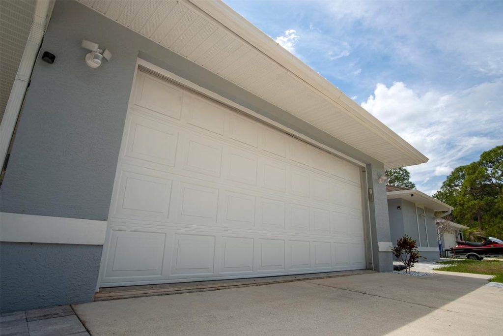 Front of house with a close up of the garage door