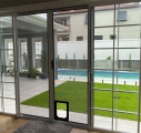 ForceField sliding door with pet flap
