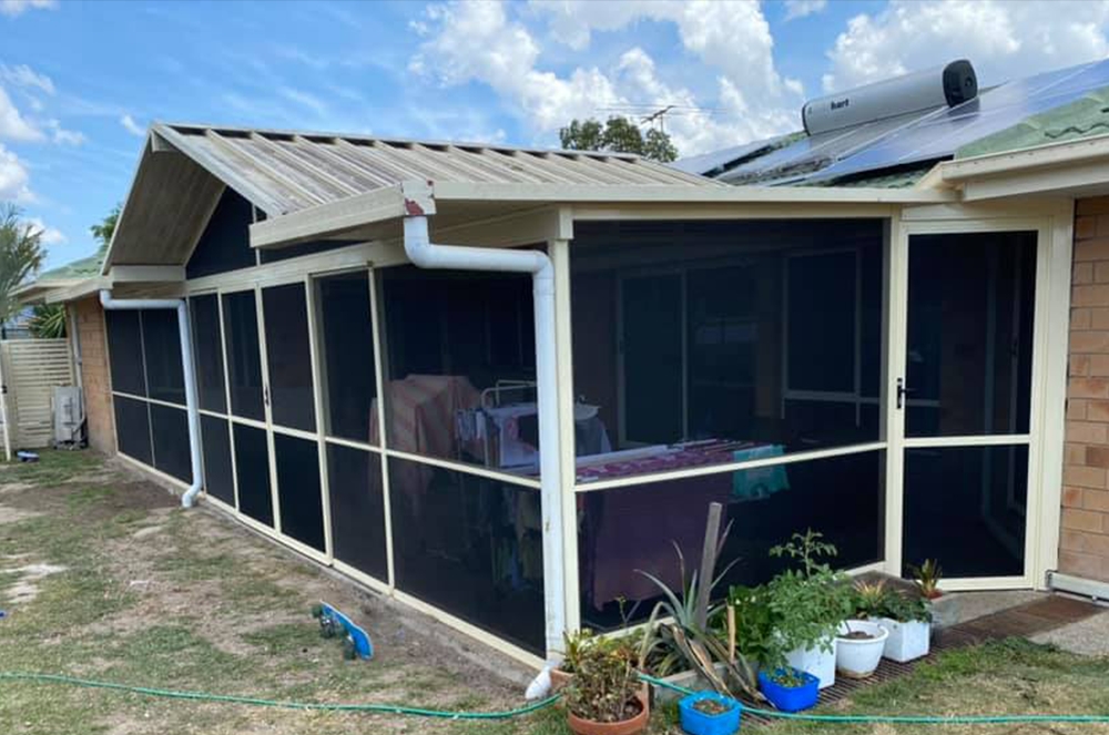ForceField patio enclosure with hinge doors